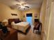 Calm bedroom with neutral tones, a comfortable bed, and ample natural light at 2509 Fairweather Ct, Conyers, GA 30013