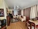 Cozy living room showcasing a fireplace, comfortable seating, and stylish decor at 2509 Fairweather Ct, Conyers, GA 30013