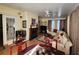 Inviting living area with a fireplace, plenty of seating, and natural light at 2509 Fairweather Ct, Conyers, GA 30013