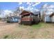 Updated bungalow with dark exterior, inviting front porch, and a charming curb appeal at 2049 Meador Se Ave, Atlanta, GA 30315