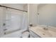 Clean bathroom with tub, shower, and white vanity at 2651 Stream Nw Ter, Atlanta, GA 30318