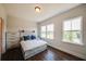 Bright bedroom with large windows, hardwood floors, and ample closet space at 2651 Stream Nw Ter, Atlanta, GA 30318