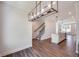 Bright dining area with hardwood floors and a linear chandelier at 2651 Stream Nw Ter, Atlanta, GA 30318