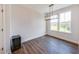 Dining room with hardwood floors and large windows at 2651 Stream Nw Ter, Atlanta, GA 30318