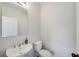 Clean powder room with pedestal sink and toilet at 2651 Stream Nw Ter, Atlanta, GA 30318