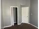 Bedroom with closet and door, gray walls, brown carpet at 20 Pine Canyon Sw Dr # 41, Atlanta, GA 30331