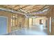 Unfinished basement with framed walls, open space and a door at 1050 Wiley Bridge Rd, Woodstock, GA 30188