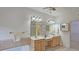 Elegant bathroom with double vanity, soaking tub, and walk-in shower at 1050 Wiley Bridge Rd, Woodstock, GA 30188