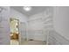 Spacious walk-in closet, offering extensive storage with wire shelving at 1050 Wiley Bridge Rd, Woodstock, GA 30188