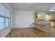 Bright dining area with hardwood floors and kitchen access at 1050 Wiley Bridge Rd, Woodstock, GA 30188