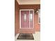 Elegant double front door with glass accents and welcome mat at 1050 Wiley Bridge Rd, Woodstock, GA 30188