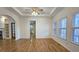 Spacious living room with hardwood floors and coffered ceiling at 1050 Wiley Bridge Rd, Woodstock, GA 30188
