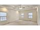 Large main bedroom with high ceilings and ceiling fan at 1050 Wiley Bridge Rd, Woodstock, GA 30188