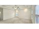 Main bedroom with window and access to bathroom at 1050 Wiley Bridge Rd, Woodstock, GA 30188