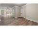 Basement hallway with neutral paint and hardwood floors at 100 Percheron Dr, Canton, GA 30114