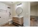 Modern basement bathroom with a walk-in shower and floating vanity at 100 Percheron Dr, Canton, GA 30114