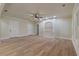 Finished basement area with built-in shelving and hardwood floors at 100 Percheron Dr, Canton, GA 30114