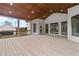 Open-air covered porch with wooden ceiling, screened sides and views of the backyard at 100 Percheron Dr, Canton, GA 30114