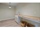 Basement laundry room with farmhouse sink and butcher block countertop at 100 Percheron Dr, Canton, GA 30114