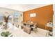 Bright dining area with wood table and an accent wall at 110 Cobalt Dr, Fayetteville, GA 30214