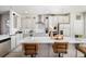 Bright kitchen featuring white shaker cabinets and a large island at 110 Cobalt Dr, Fayetteville, GA 30214