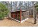 A charming gazebo is surrounded by mature trees, offering a peaceful outdoor retreat at 1579 Howell Highlands Dr, Stone Mountain, GA 30087