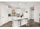 Kitchen with white cabinets, granite countertops, stainless steel appliances, and a center island with seating at 1590 Ridgebrook Downs, Mableton, GA 30126