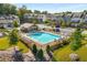 Aerial view of community pool and surrounding townhomes at 1590 Ridgebrook Downs, Mableton, GA 30126