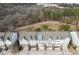 Aerial view of townhomes with tree-lined green space at 2134 Old Georgian Nw Ter, Atlanta, GA 30318