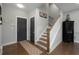 Elegant entryway with hardwood floors and staircase at 2134 Old Georgian Nw Ter, Atlanta, GA 30318