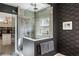 Modern bathroom with a large walk-in shower and gray tile at 5220 Green Oak Ct, Atlanta, GA 30327