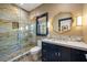 Spa-like bathroom with a large walk-in shower and marble tile at 5220 Green Oak Ct, Atlanta, GA 30327