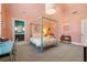 Bright bedroom with a four-poster bed and en-suite bathroom at 5220 Green Oak Ct, Atlanta, GA 30327