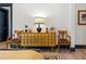 Serene bedroom with a gold dresser and armchairs at 5220 Green Oak Ct, Atlanta, GA 30327