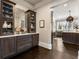 Butlers pantry with custom cabinetry and a unique backsplash at 5220 Green Oak Ct, Atlanta, GA 30327