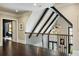 Open second floor hallway with dark hardwood floors and high ceilings at 5220 Green Oak Ct, Atlanta, GA 30327