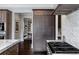 Modern kitchen features dark wood cabinetry and a spacious layout at 5220 Green Oak Ct, Atlanta, GA 30327