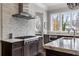 High-end kitchen featuring a gas range and marble countertops at 5220 Green Oak Ct, Atlanta, GA 30327