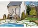 Clean lines and geometric design of the pool and patio, next to the house at 5220 Green Oak Ct, Atlanta, GA 30327