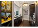 Modern wet bar with dark cabinetry and a granite countertop at 5220 Green Oak Ct, Atlanta, GA 30327