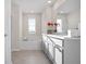 Elegant bathroom with double vanity and soaking tub at 1508 Denver Way, Locust Grove, GA 30248