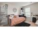 Cozy bedroom with daybed and built-in shelving at 1508 Denver Way, Locust Grove, GA 30248