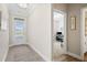 Bright entryway with view to an office or study at 427 Bluffs View Ln, Canton, GA 30114