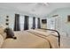 King-size bedroom with a cozy and inviting atmosphere at 615 Keeneland Ter, Woodstock, GA 30189