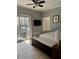 Serene bedroom with a comfortable bed and access to a private balcony at 195 14Th Ne St # 902, Atlanta, GA 30309