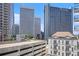 City view from balcony showing office towers and residential buildings at 195 14Th Ne St # 902, Atlanta, GA 30309
