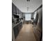 Well-appointed kitchen with stainless steel appliances and stylish backsplash at 195 14Th Ne St # 902, Atlanta, GA 30309
