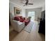Bright living room with hardwood floors, modern furniture, and sliding glass doors to balcony at 195 14Th Ne St # 902, Atlanta, GA 30309