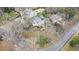 Aerial view of the property shows well-maintained lawns and other houses nearby at 7 W Andrews Nw Dr, Atlanta, GA 30305