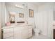 Bright bathroom featuring an extended vanity, updated fixtures, and a shower-tub combo at 7 W Andrews Nw Dr, Atlanta, GA 30305